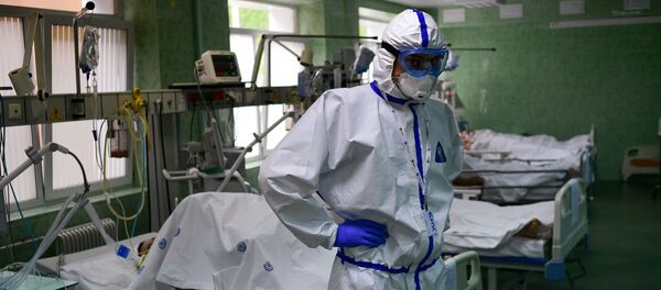 Врач и пациенты в отделении реанимации и интенсивной терапии городской клинической больницы имени В. В. Виноградова - 俄羅斯衛星通訊社