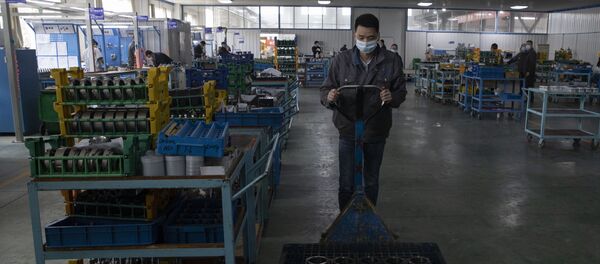 Китайский рабочий на заводе по производству коробок передач для авто Китайский рабочий на заводе по производству коробок передач для авто - 俄羅斯衛星通訊社