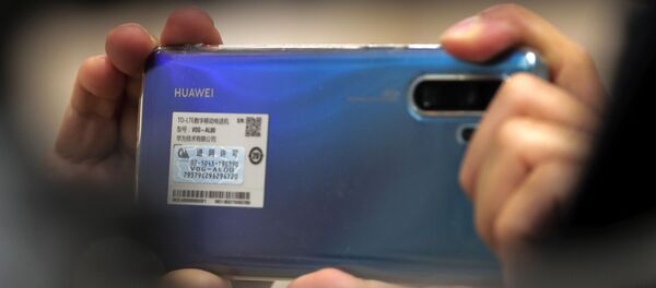 Репортер на пресс-конференции министра торговли Китая Чжун Шаня 18 мая 2020 Репортер на пресс-конференции министра торговли Китая Чжун Шаня 18 мая 2020 - 俄羅斯衛星通訊社