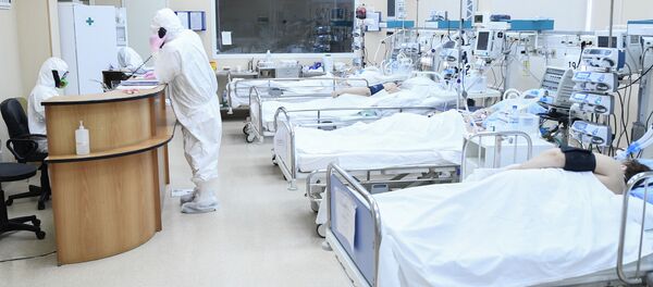  Врачи и пациенты с COVID-19 в палате центральной клинической больницы РЖД-Медицина в Москве.  - 俄羅斯衛星通訊社