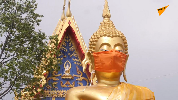 泰國佛像被戴口罩 提醒民眾疫情期間遵守安全措施 - 俄羅斯衛星通訊社