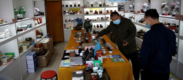 Покупатель в магазине - 俄羅斯衛星通訊社