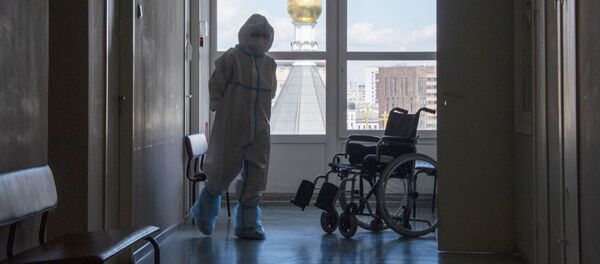 Врач в коридоре Университетской клинической больницы No2 Первого Московского государственного медицинского университета имени И. М. Сеченова. Врач в коридоре Университетской клинической больницы No2 Первого Московского государственного медицинского университета имени И. М. Сеченова. - 俄羅斯衛星通訊社