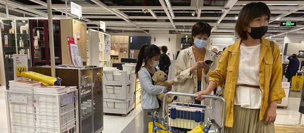 Женщины в магазине. Китай - 俄罗斯卫星通讯社