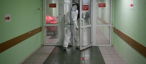 Медицинские работники в госпитале COVID-19 в ГКБ №15 имени О. М. Филатова - 俄羅斯衛星通訊社