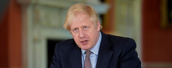 Britain's Prime Minister Boris Johnson speaks during filming of his address to the nation from No 10 Downing Street following the outbreak of the coronavirus disease (COVID-19), London, Britain, May 10, 2020 Britain's Prime Minister Boris Johnson speaks during filming of his address to the nation from No 10 Downing Street following the outbreak of the coronavirus disease (COVID-19), London, Britain, May 10, 2020 - 俄羅斯衛星通訊社