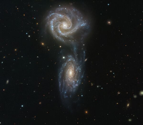 Спиральные взаимодействующие галактики NGC 5426 и NGC 5427 - 俄羅斯衛星通訊社