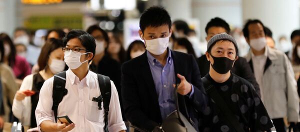 地铁里、大街上、汽车里或是摩托车上，很多人都戴着口罩 - 俄罗斯卫星通讯社