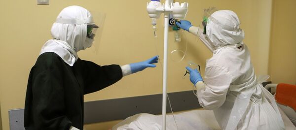 Сотрудники инфекционного корпуса, где лечат пациентов с COVID-19 - 俄罗斯卫星通讯社