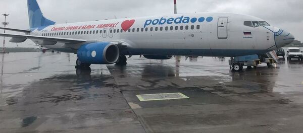 Самолет авиакомпании Победа в медицинской маске - 俄罗斯卫星通讯社