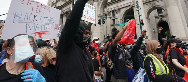 Протестующие на одной из улиц Нью-Йорка. Протестующие на одной из улиц Нью-Йорка. - 俄罗斯卫星通讯社