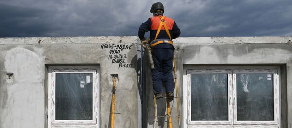 Рабочий на стройке в Москве - 俄罗斯卫星通讯社