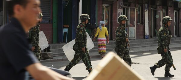 Полиция патрулирует Улицы Урумчи - 俄羅斯衛星通訊社