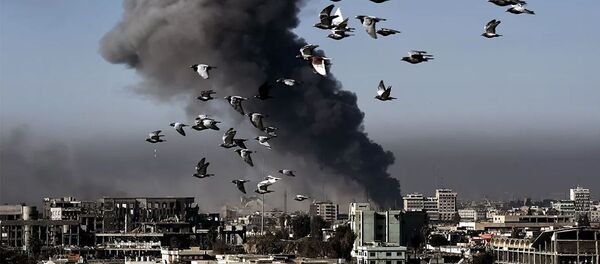 Дым после авиаудара в Мосуле. Архивное фото - 俄罗斯卫星通讯社