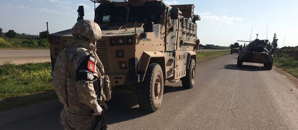 Военнослужащий российской военной полиции во время патрулирования в Сирии Военнослужащий российской военной полиции во время патрулирования в Сирии - 俄罗斯卫星通讯社