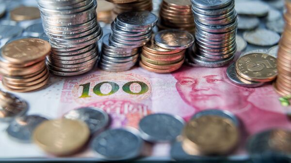 Монеты и банкноты китайских юаней  - 俄羅斯衛星通訊社
