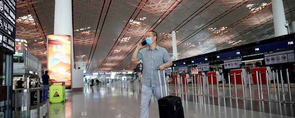 三部門：來華航班乘客憑新冠病毒核酸檢測陰性證明登機 - 俄羅斯衛星通訊社