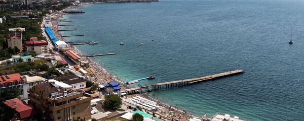 Вид на набережную с Генуэзской крепости в Судаке Вид на набережную с Генуэзской крепости в Судаке - 俄罗斯卫星通讯社