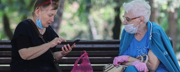 Пожилые женщины в медицинских масках Пожилые женщины в медицинских масках - 俄羅斯衛星通訊社