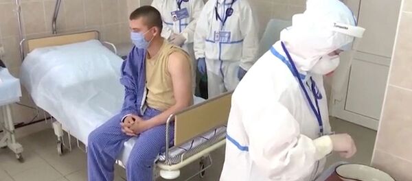 Вакцинация добровольцев против коронавируса SARS-CoV-2 в Главном военном клиническом госпитале имени Н. Н. Бурденко в Москве.  - 俄羅斯衛星通訊社