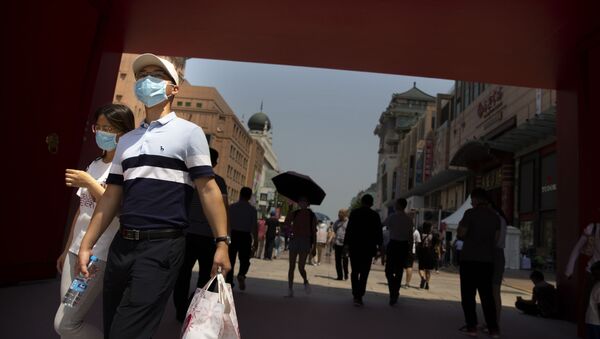 Мужчина с покупками. Пекин - 俄羅斯衛星通訊社