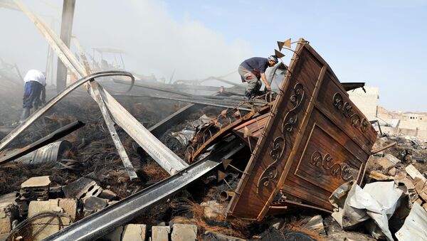 Последствия авиаударов по столице Йемена Сане - 俄羅斯衛星通訊社