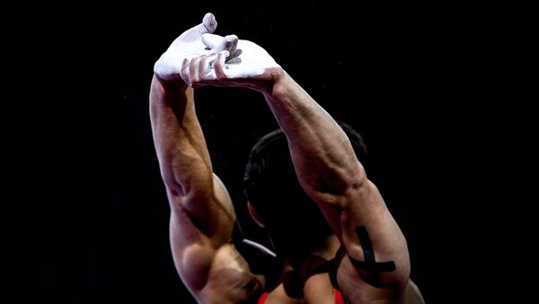 Артур Далалоян в финале вольных упражнений среди мужчин на чемпионате мира по спортивной гимнастике в Штутгарте. - 俄罗斯卫星通讯社