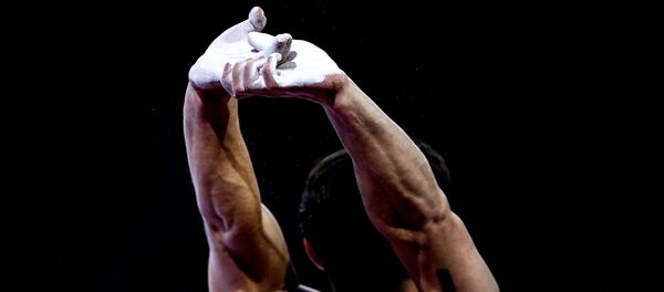 Артур Далалоян в финале вольных упражнений среди мужчин на чемпионате мира по спортивной гимнастике в Штутгарте. - 俄罗斯卫星通讯社