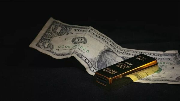Доллар и слиток золота - 俄羅斯衛星通訊社