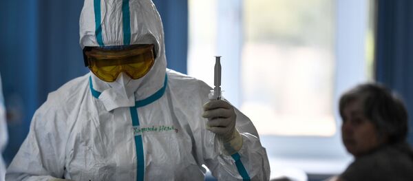  Врач в госпитале для лечения зараженных коронавирусной инфекцией COVID-19, созданного на базе Национального медицинского исследовательского центра травматологии и ортопедии имени Н. Н. Приорова в Москве. - 俄罗斯卫星通讯社