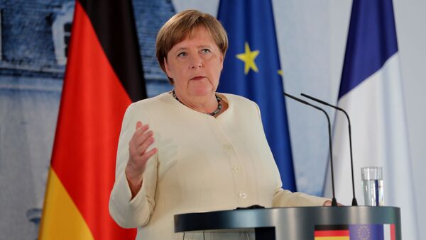 Канцлер Германии Ангела Меркель во время выступления на совместной пресс-конференции с президентом Франции Эммануэлем Макроном - 俄罗斯卫星通讯社