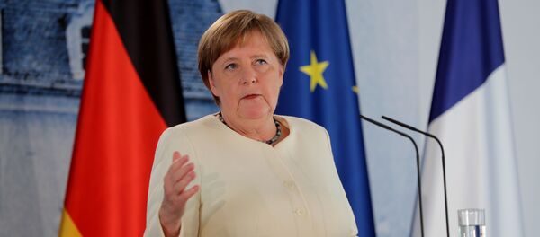 Канцлер Германии Ангела Меркель во время выступления на совместной пресс-конференции с президентом Франции Эммануэлем Макроном - 俄罗斯卫星通讯社